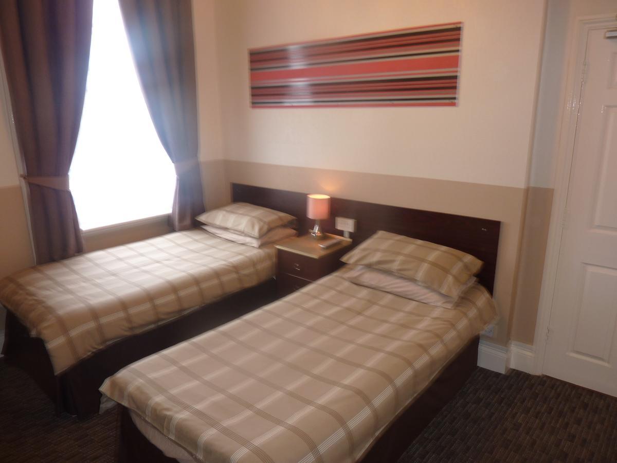 Spalite Hotel Глостер Экстерьер фото